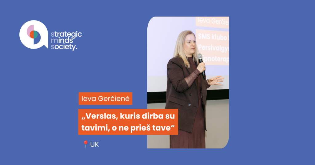 Speaker (woman) with microphone on stage against blue background; visible logo 'strategic minds society' on left and orange quote panels featuring a name.